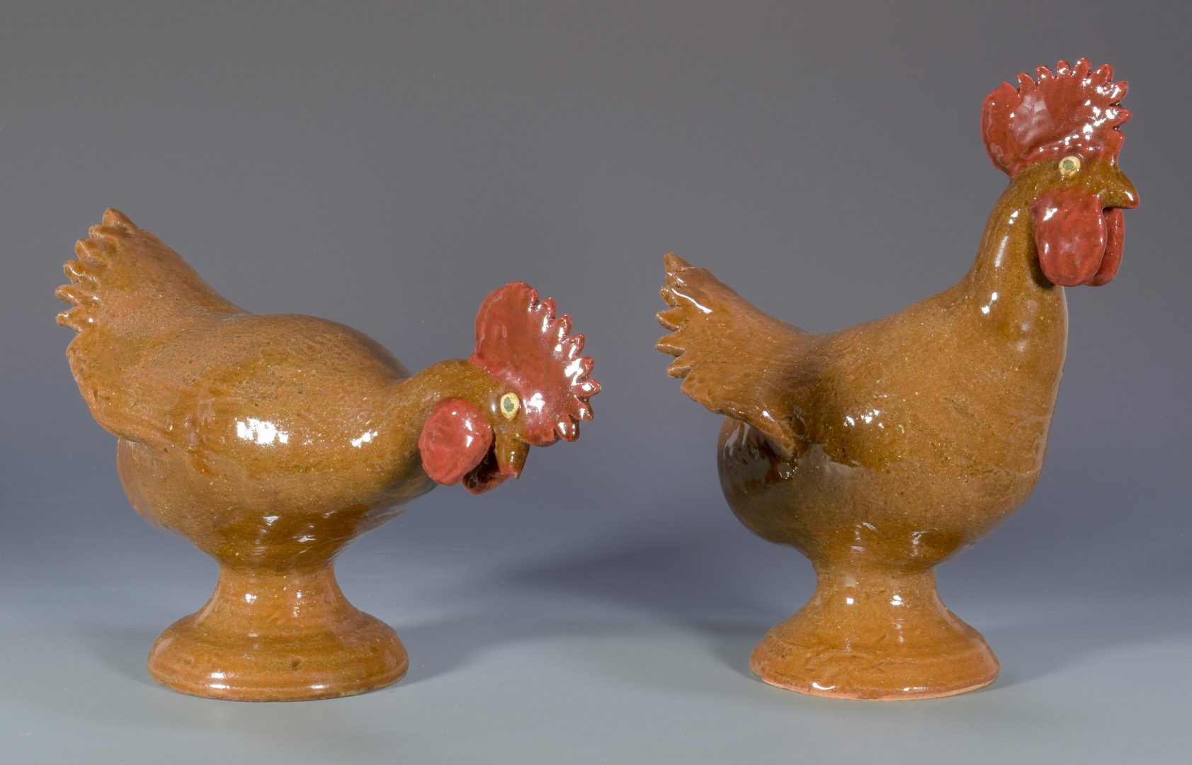 Lot 559: 2 Reggie Meaders Southern Folk Pottery Roosters