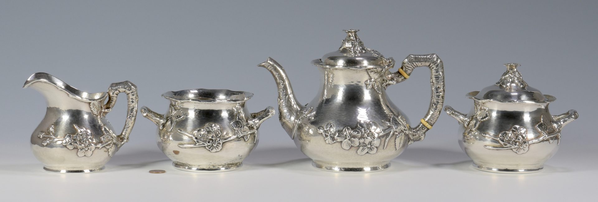Lot 56: Gorham Hammered Aesthetic Silver Tea Service