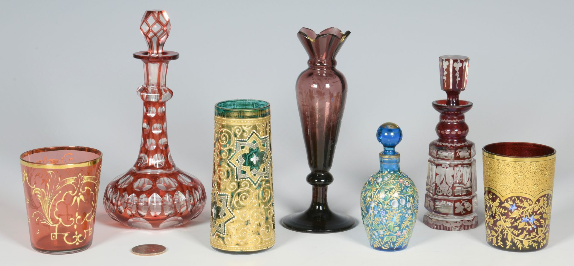 Lot 685: 7 Colored Glass Perfume Bottles and Cups
