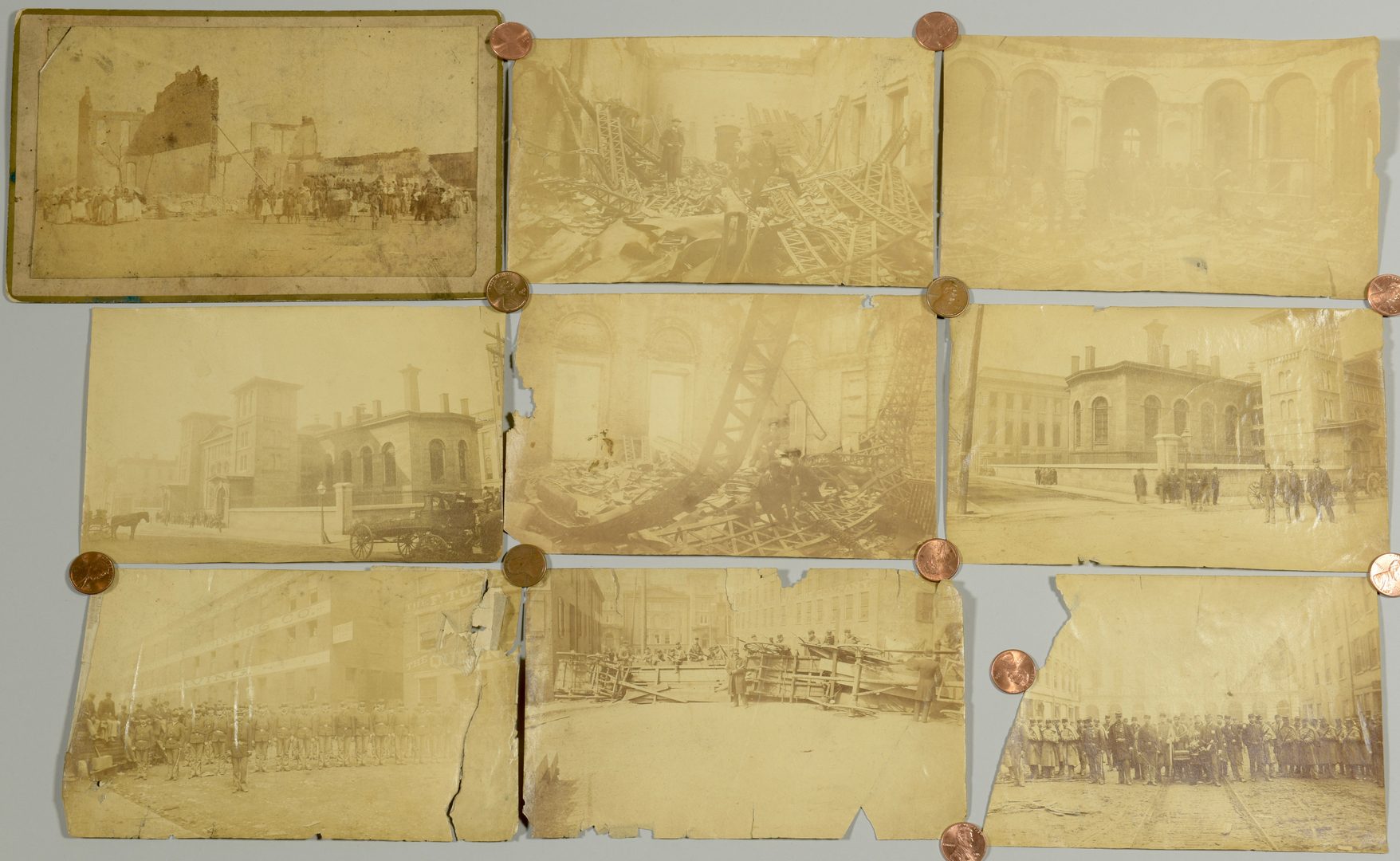 Lot 749: Cincinnati Riot of 1884 and Pulaski TN destruction, albumen prints