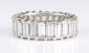Lot 74: Baguette Diamond Platinum Eternity Ring, 7 ct T.W., sold $11,092 