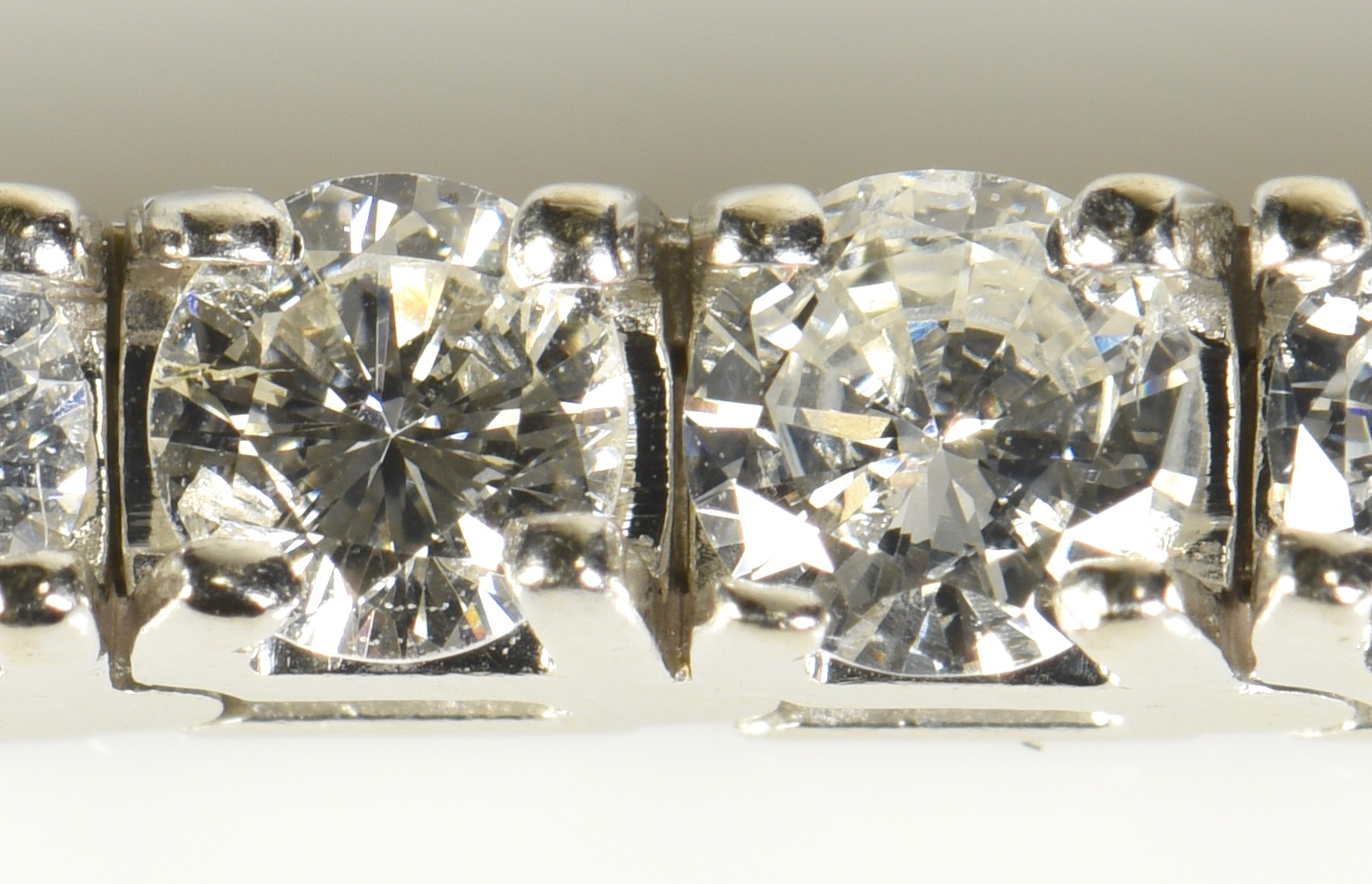 Lot 75: 14K Diamond Line Bracelet, 42 diamonds