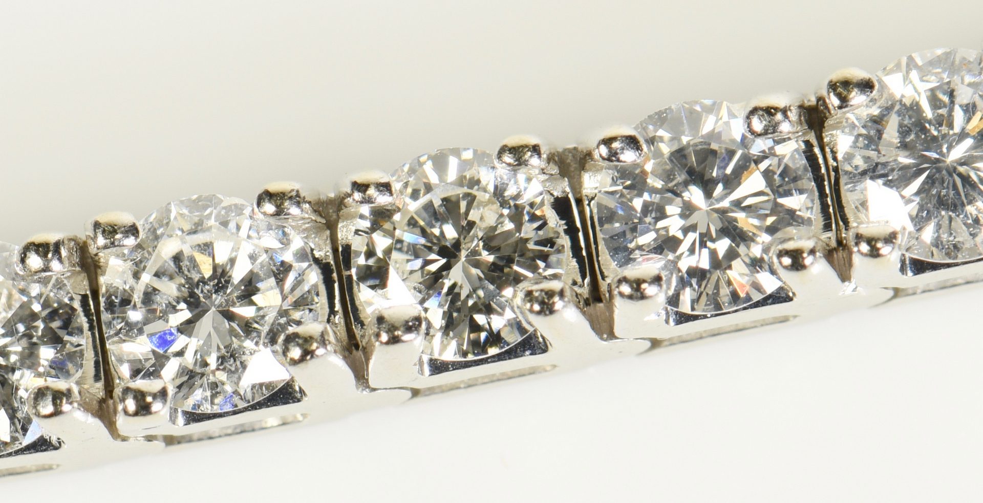 Lot 75: 14K Diamond Line Bracelet, 42 diamonds