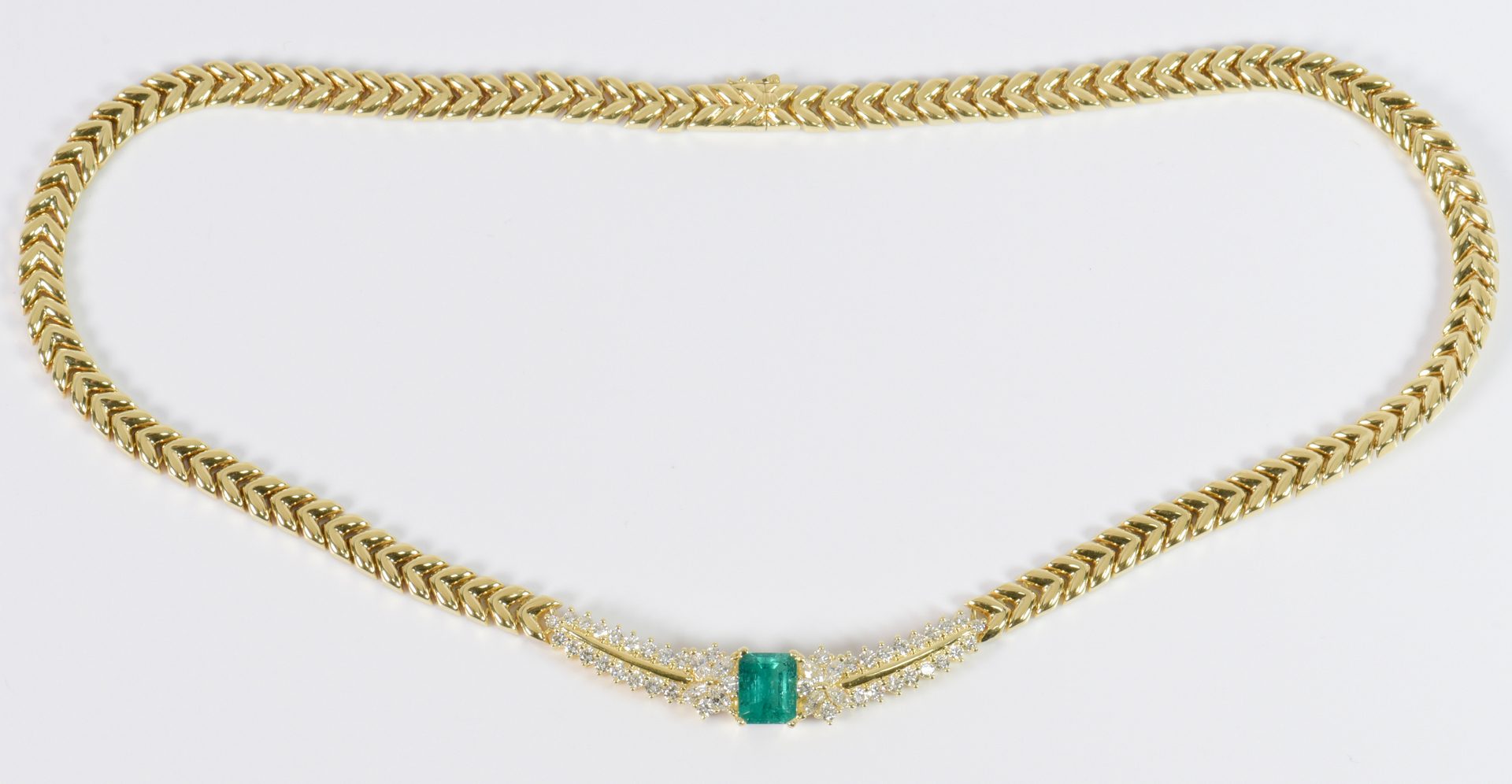 Lot 76: 18K Emerald and Diamond Necklace