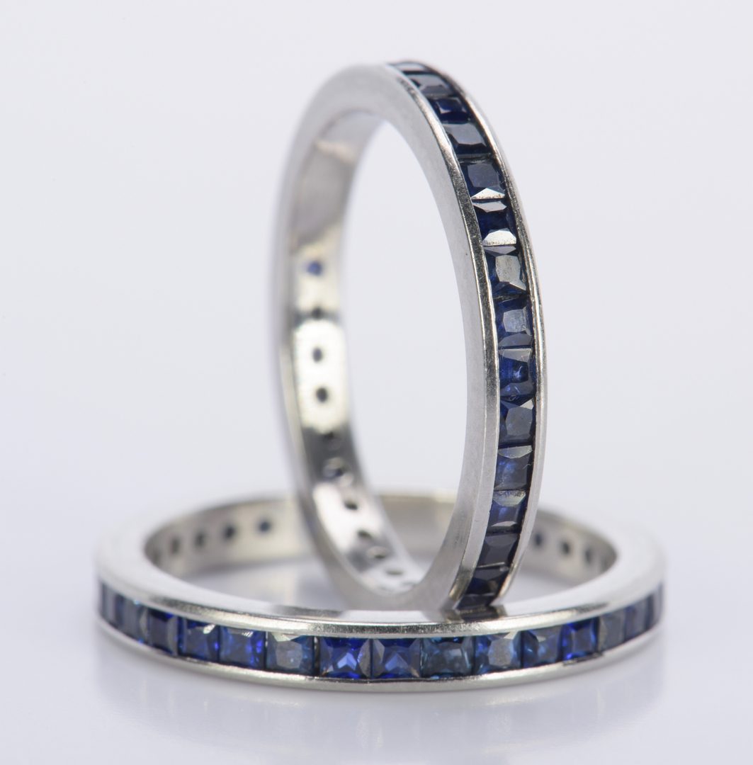 Lot 804: Pair Sapphire and Platinum Eternity Rings