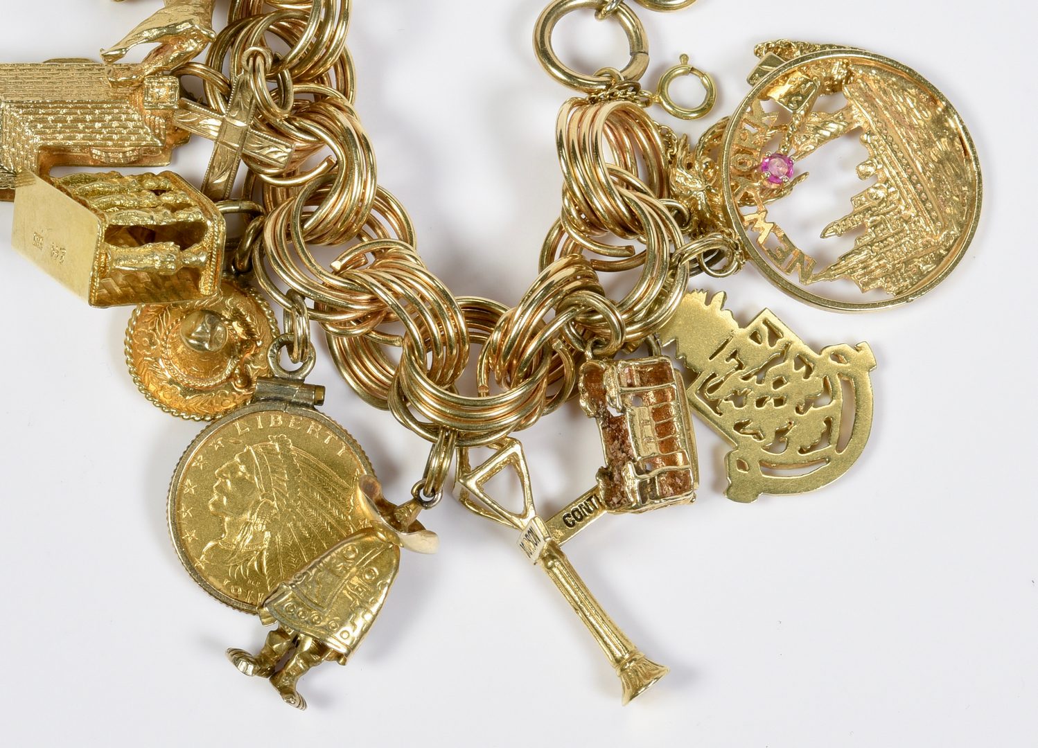 Lot 80: Charm Bracelet, 22  gold charms