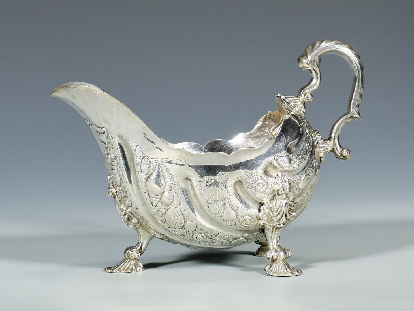 Lot 860: Rococo Style Sterling Sauceboat