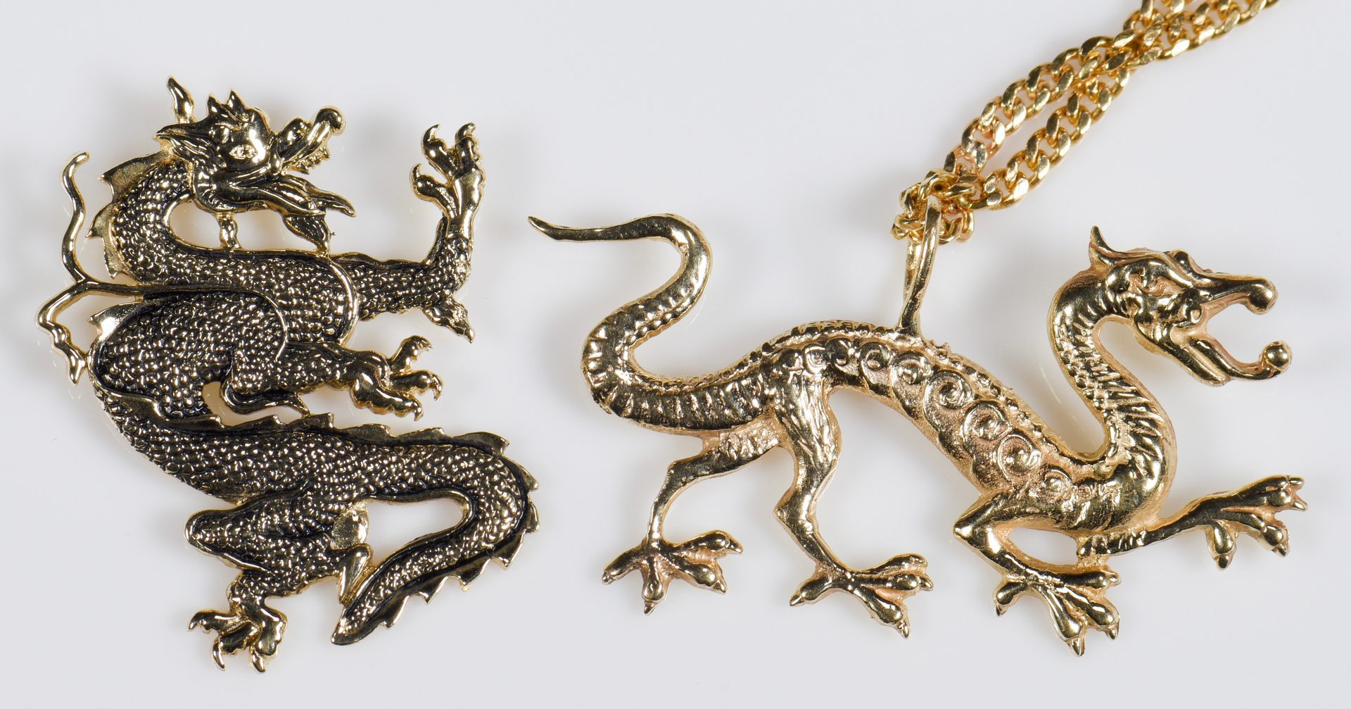 Lot 953: 3 14K Dragon Pendants with chain