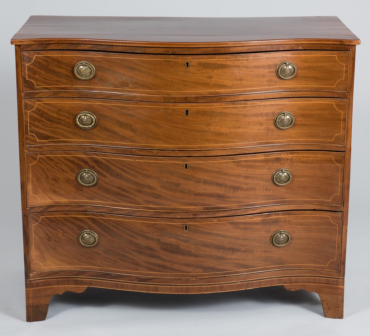 Lot 105: American or English Serpentine Chest, 19th c.