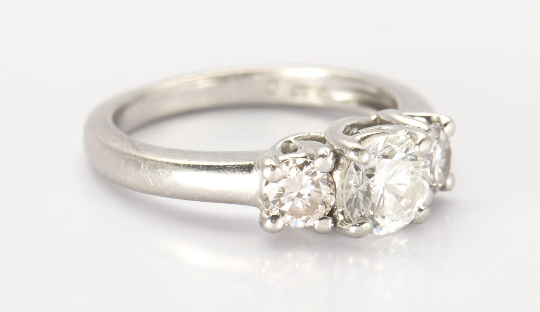 Lot 322: Platinum 3 stone Diamond Ring
