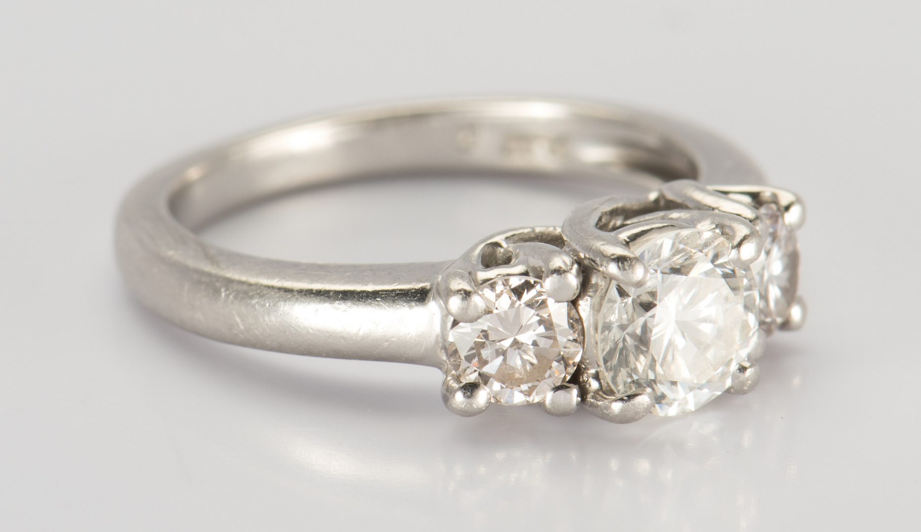 Lot 322: Platinum 3 stone Diamond Ring