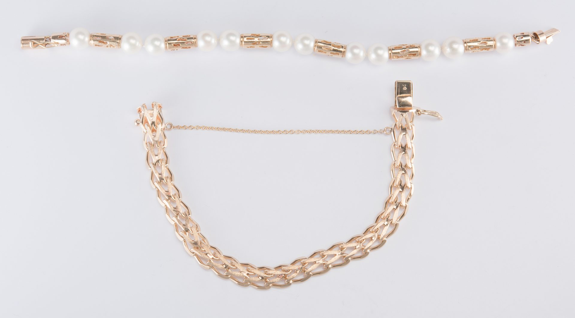 Lot 324: Two 14K Bracelets, 1 w/ pearls