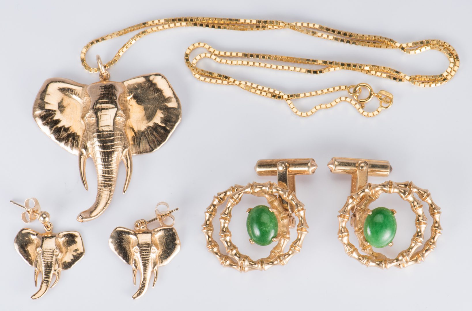 Lot 41: Gold Asian Style Jewelry