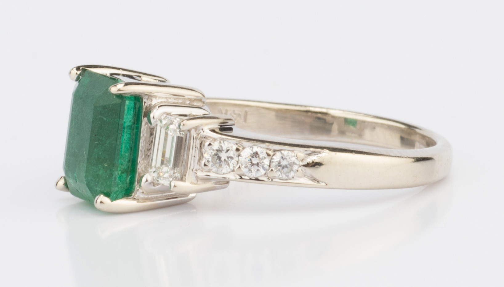 Lot 57: 14K Emerald and Diamond Ring