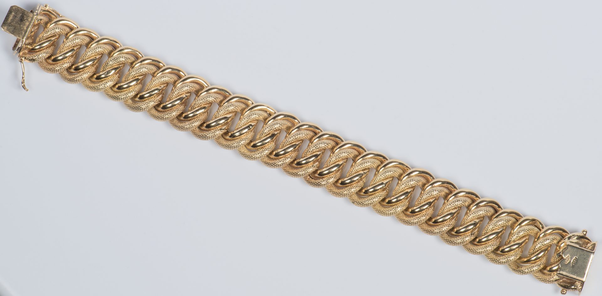 Lot 58: 18K Wide Link Bracelet, 65.2 grams