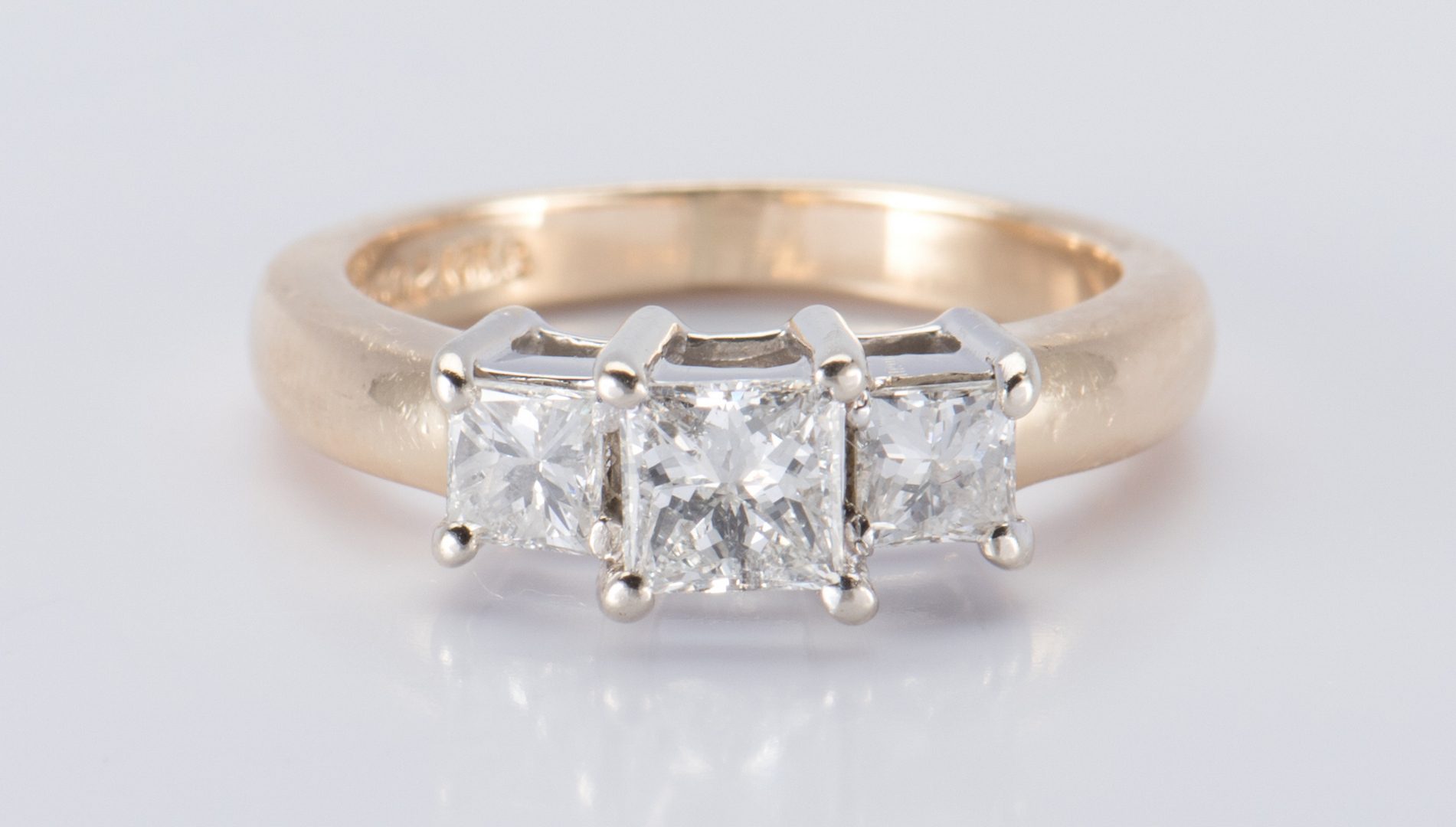 Lot 716: 14K 3 stone Princess Diamond Ring