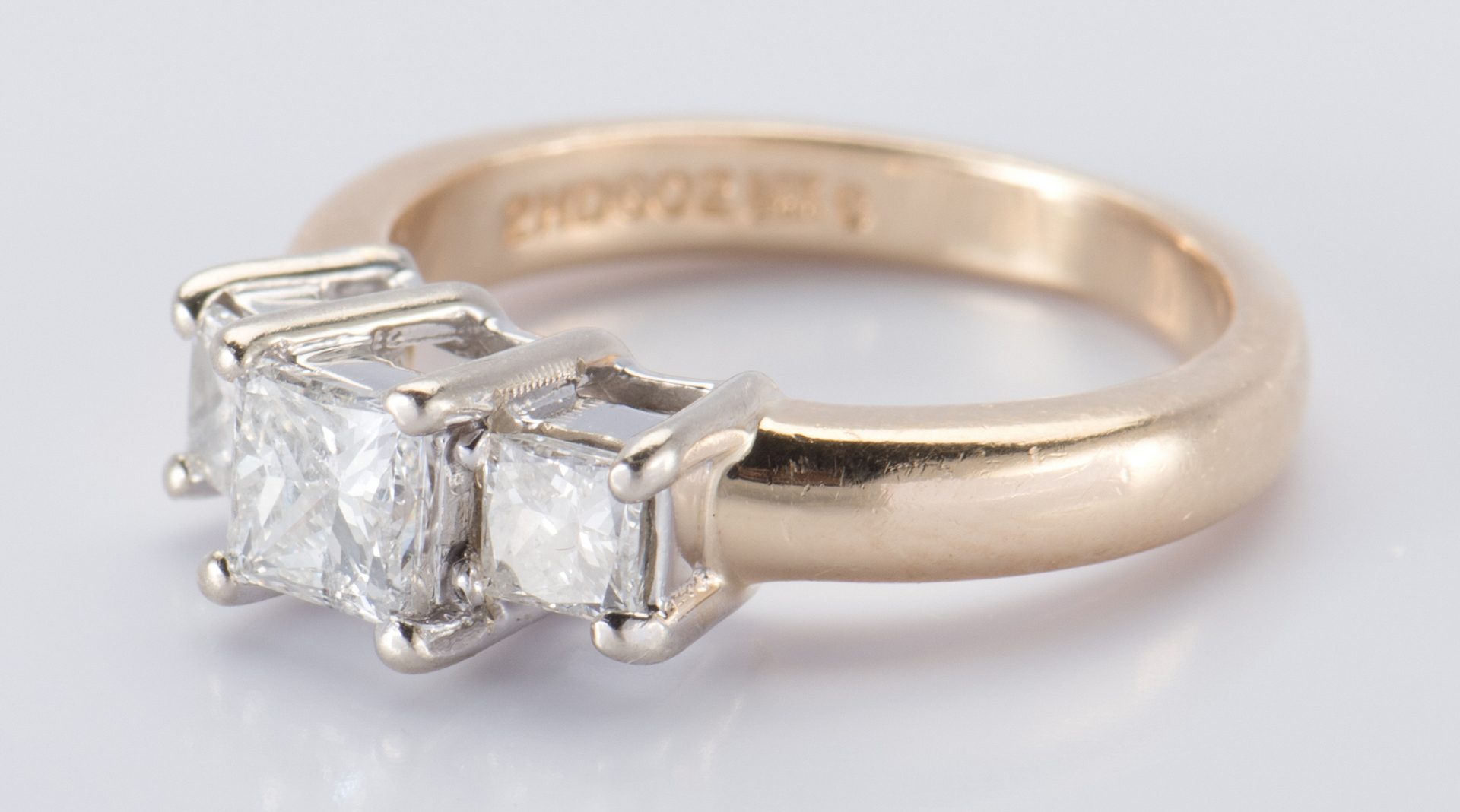 Lot 716: 14K 3 stone Princess Diamond Ring