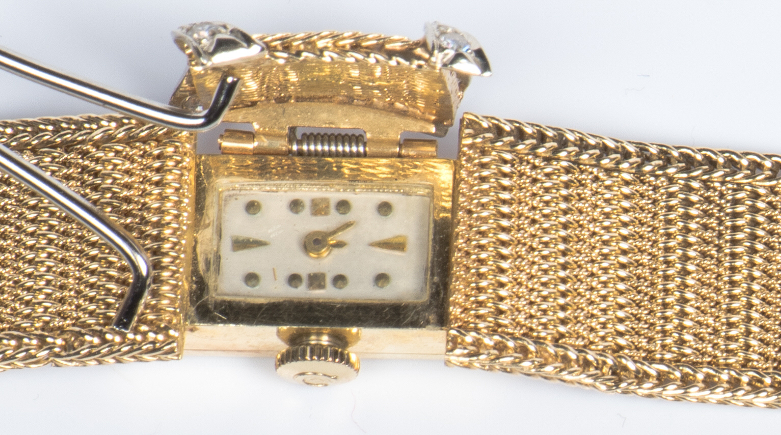 Lot 718: 14K and Diamond Bracelet Watch