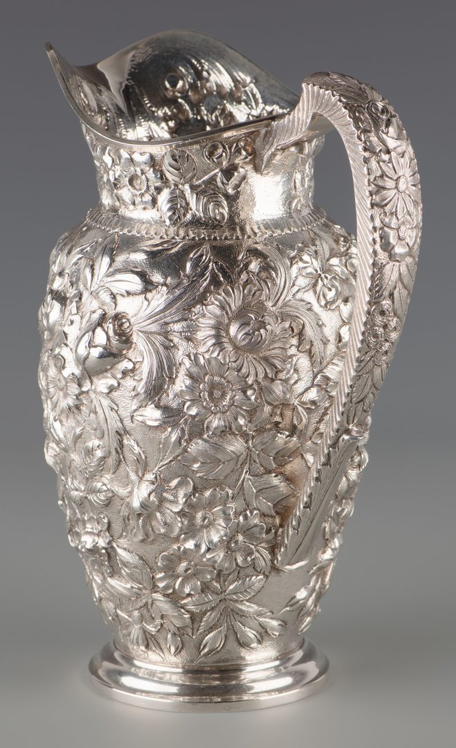 Lot 71: Kirk Sterling Repousse Water Pitcher