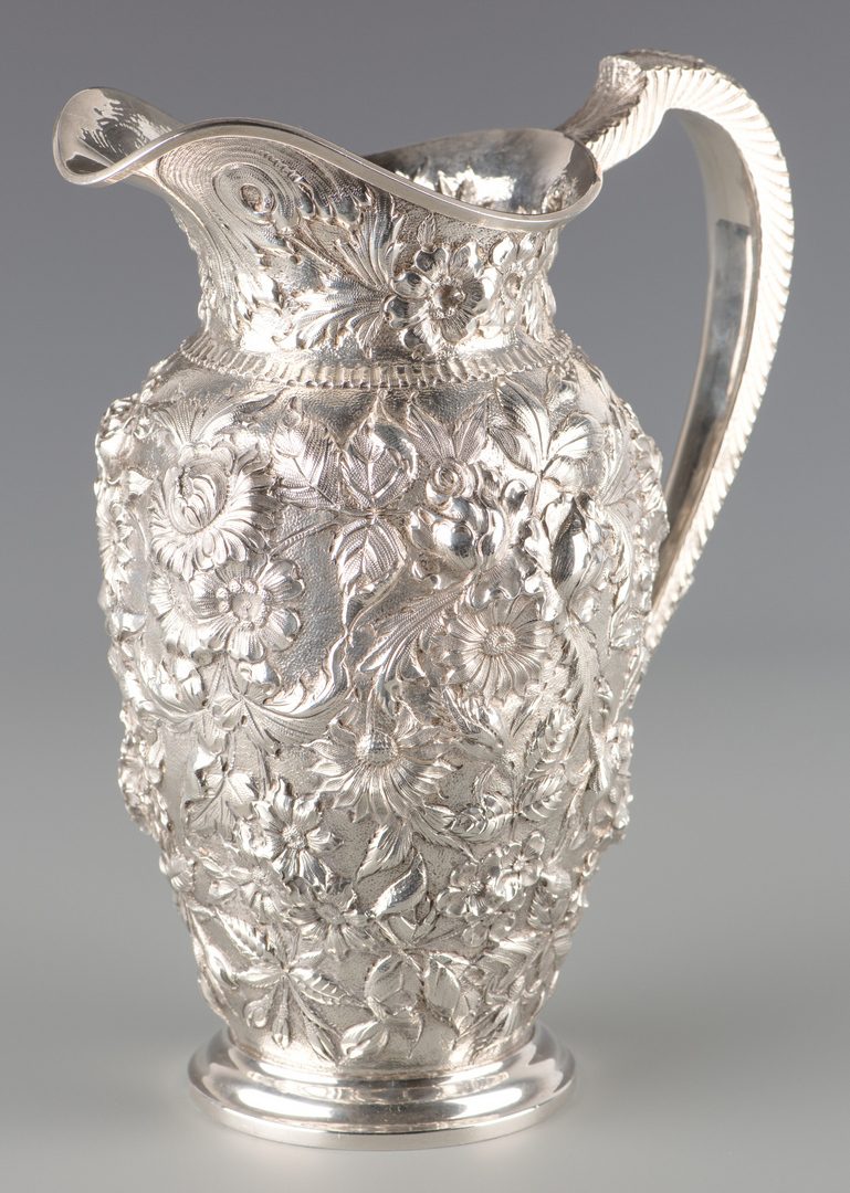 Lot 71: Kirk Sterling Repousse Water Pitcher