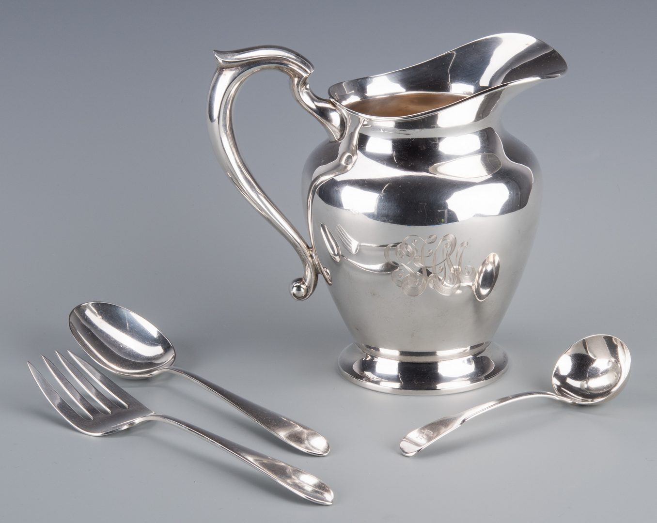 Lot 751: Sterling Pitcher and 3 pcs Flatware