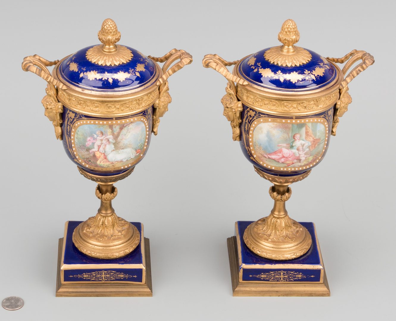 Lot 86: Pr. Sevres Gilt Mounted Porcelain Urns