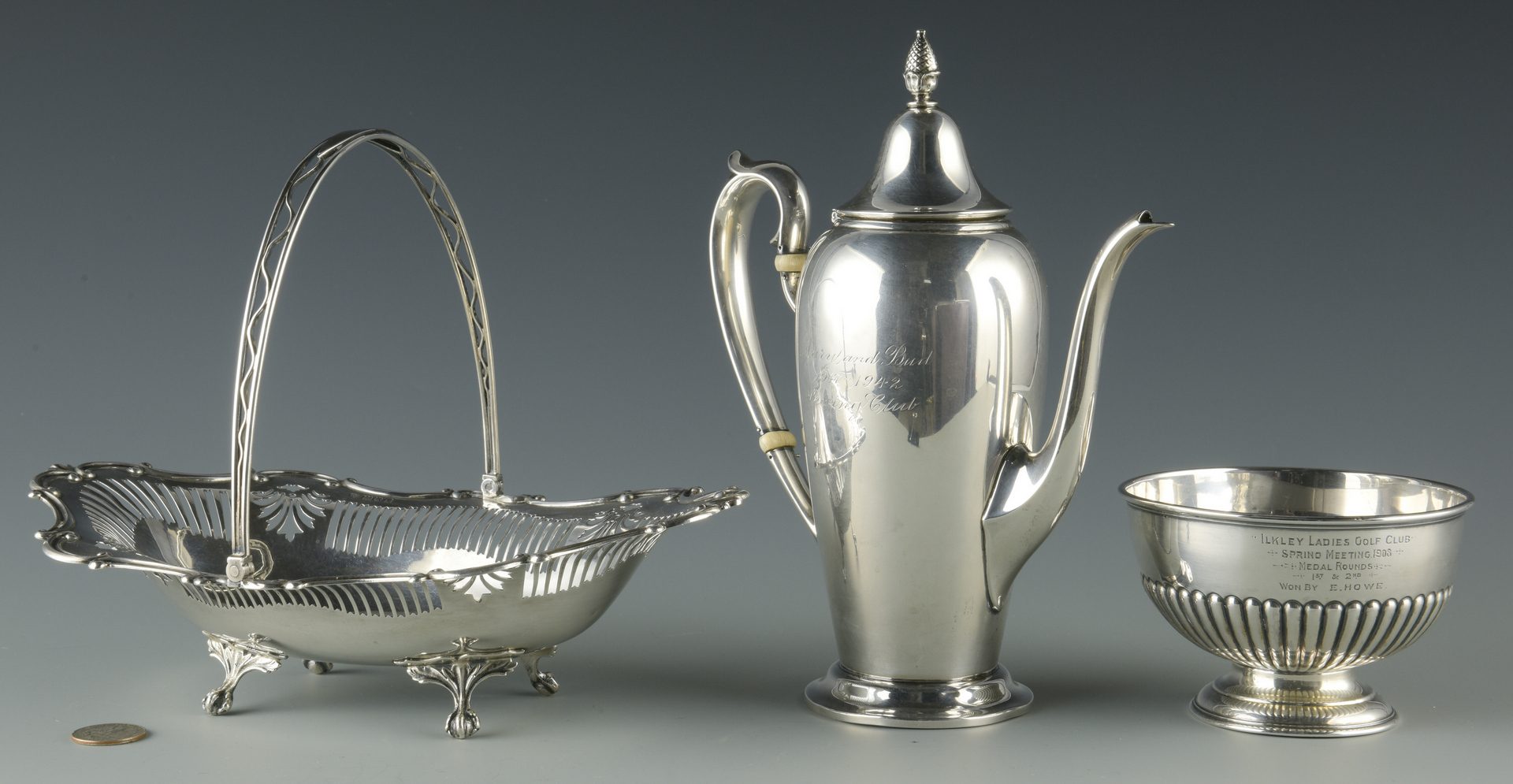 Lot 917: English teapot, basket, & golf bowl