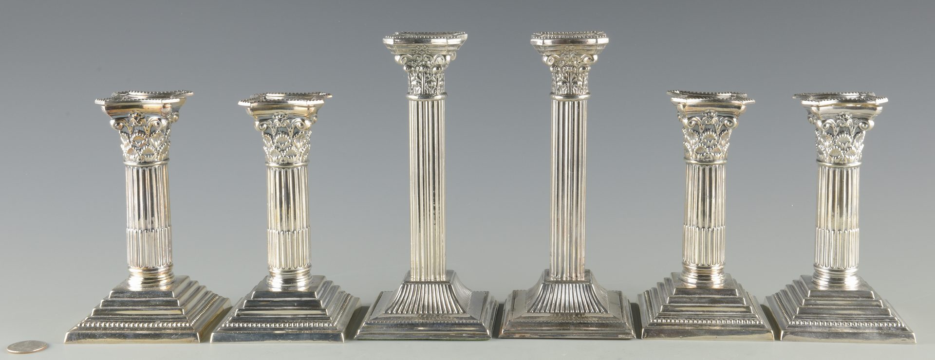 Lot 945: 4 Maupin & Webb Silverplated Candlesticks plus 2 more