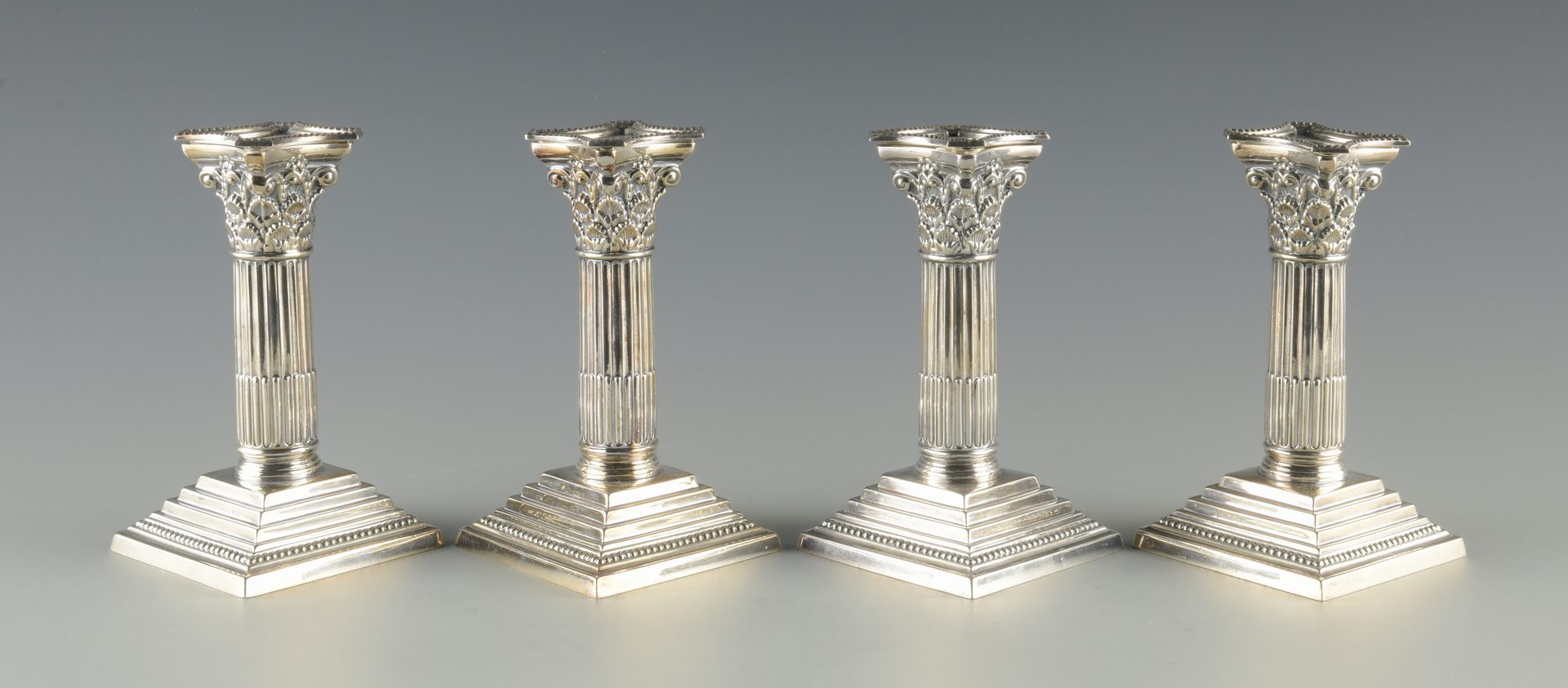 Lot 945: 4 Maupin & Webb Silverplated Candlesticks plus 2 more