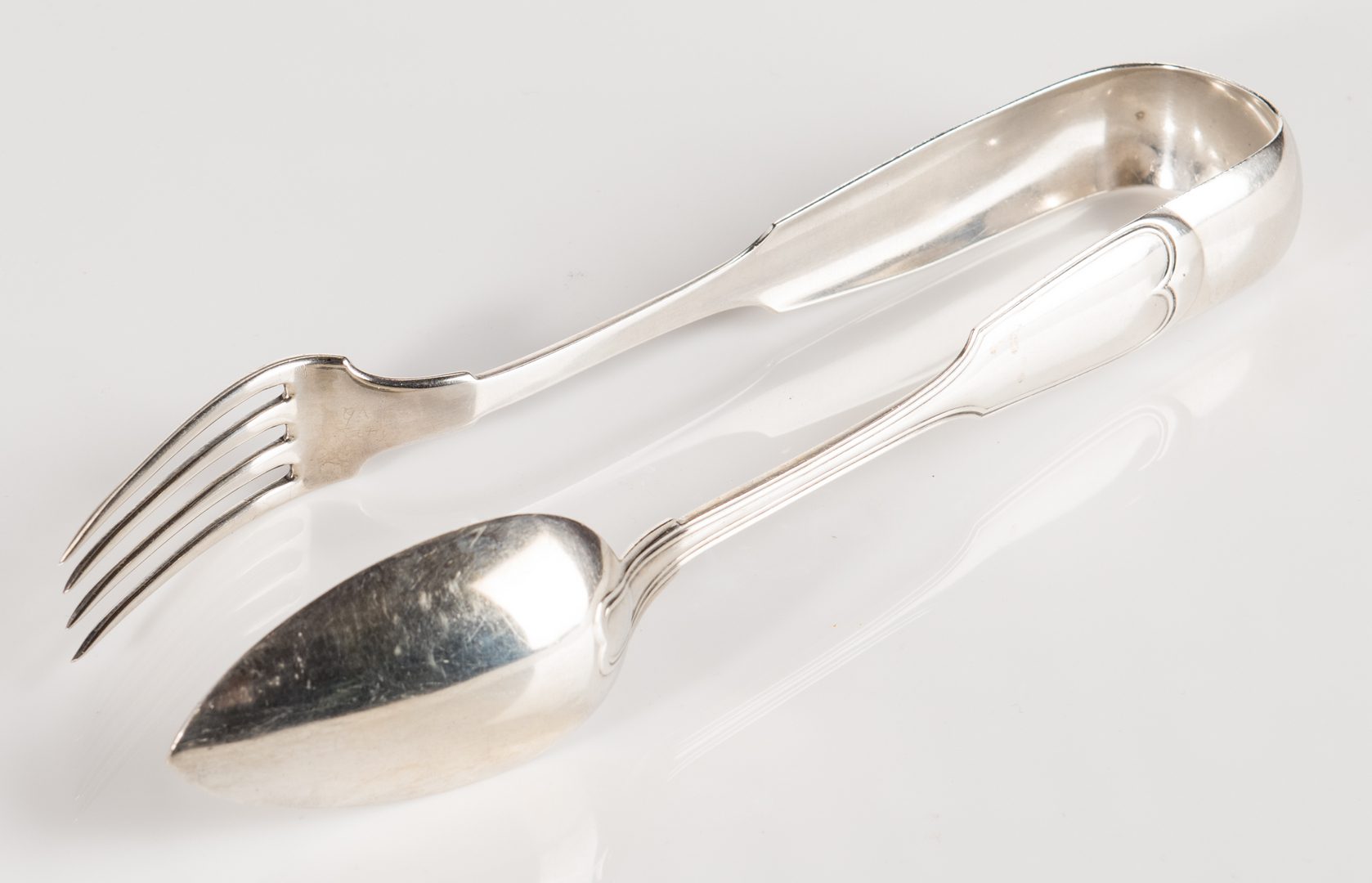 Lot 287: New Orleans Coin Silver Fried Chicken Tongs