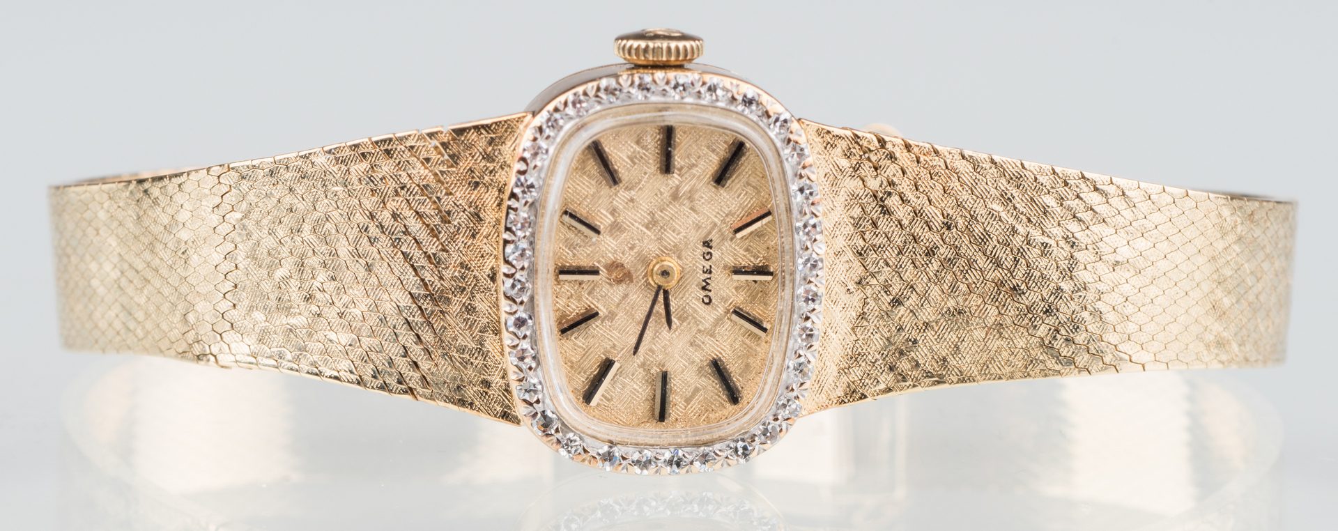 Lot 525: 14K Ladies Omega Diamond Watch