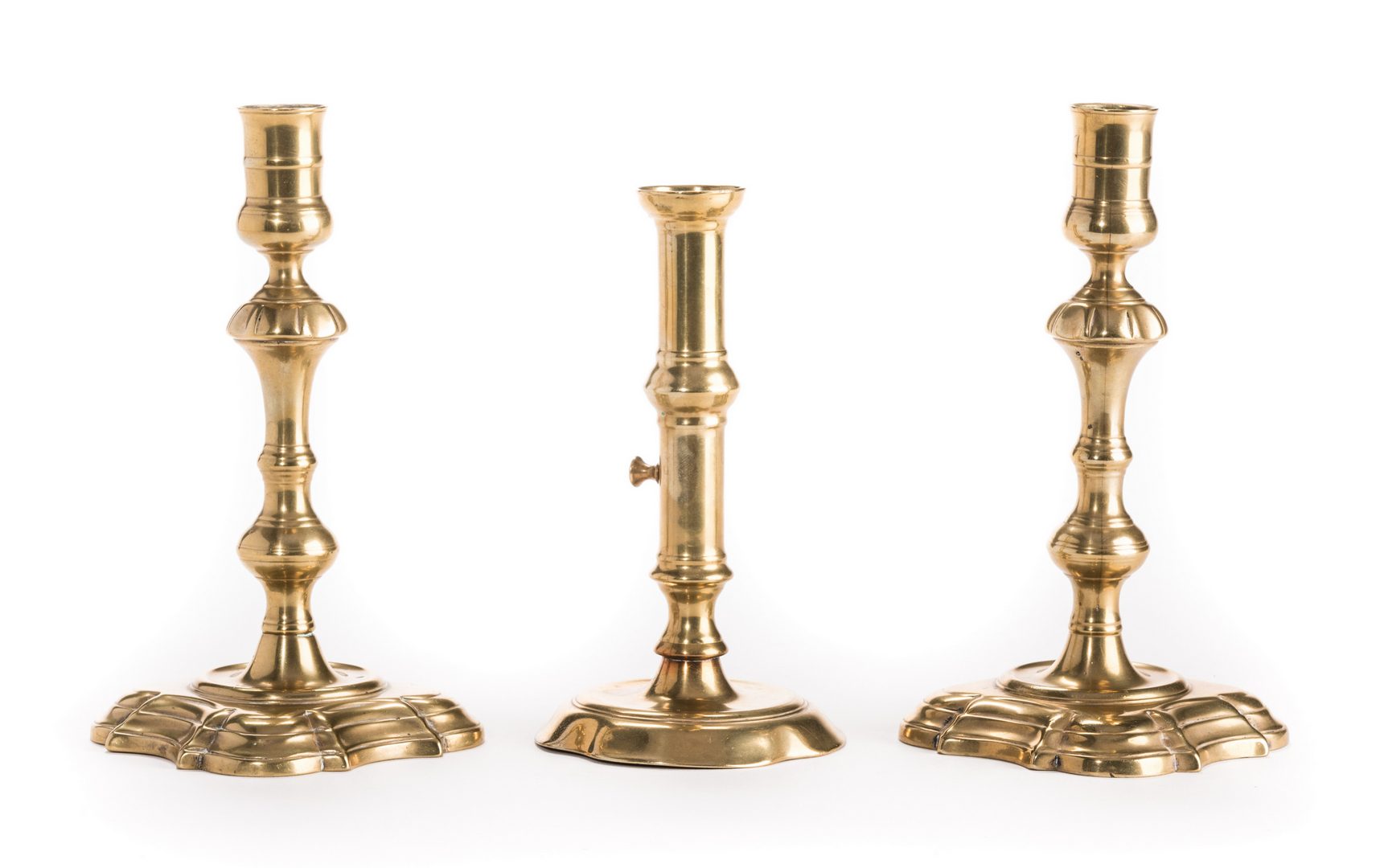Lot 629: Group Early Brass Candlesticks, 3 items