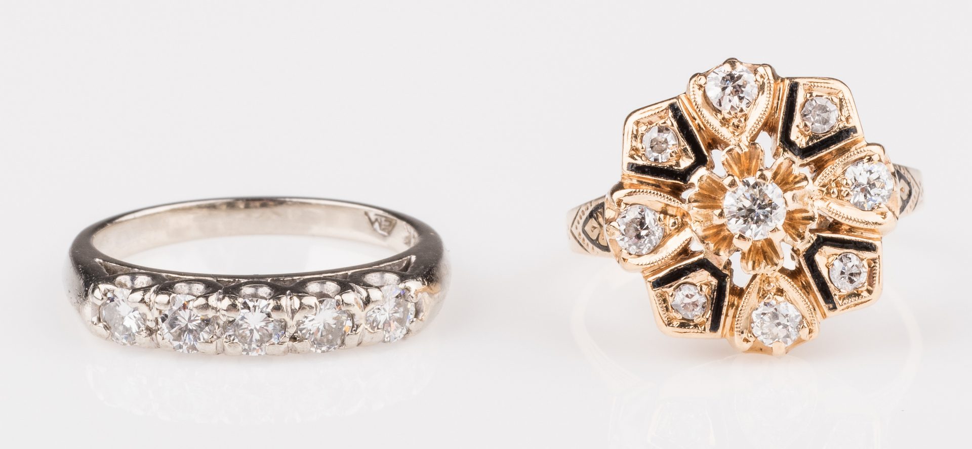 Lot 678: Two 14K Vintage Diamond Rings