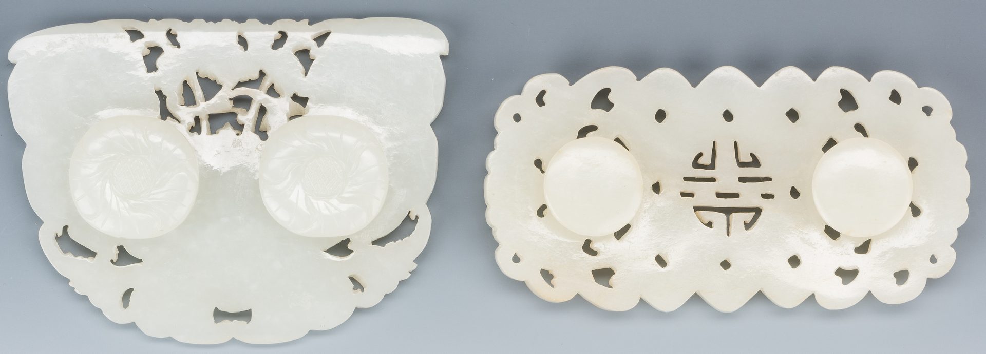Lot 1: 2 Chinese White/Pale Celadon Carved Belt Buckles