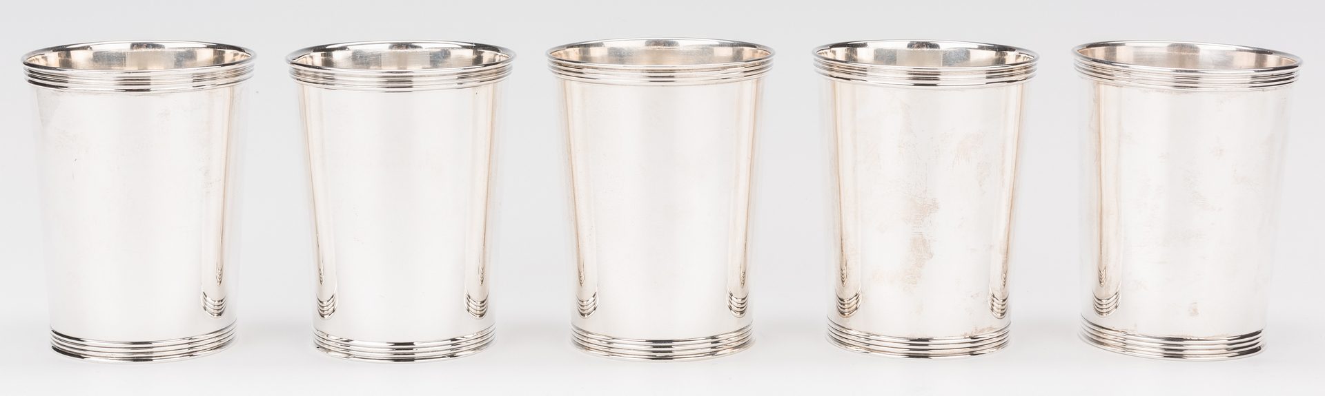 Lot 217: 5 Sterling Juleps with Horseshoe Decoration, Manchester Co.