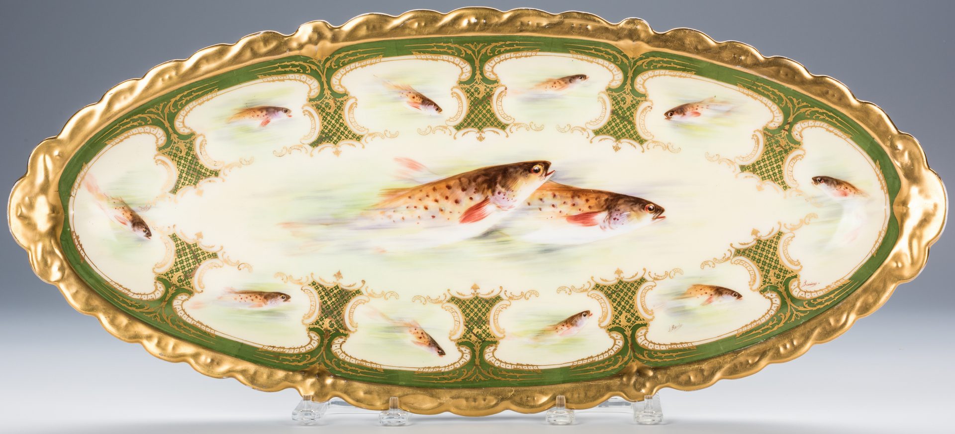 Lot 246: Limoges Fish Set – 12 plates plus platter, artist signed