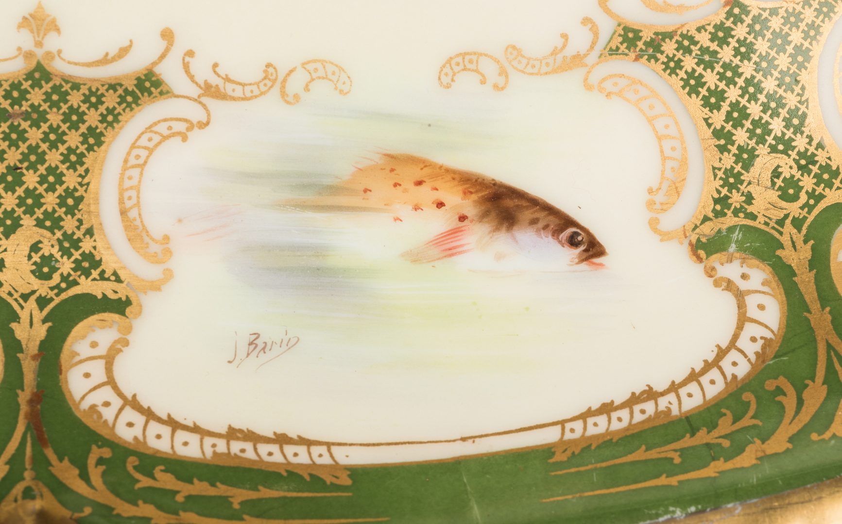 Lot 246: Limoges Fish Set – 12 plates plus platter, artist signed