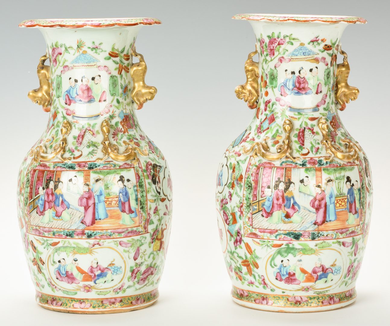 Lot 24: Pr. Chinese Export Rose Mandarin Baluster Vases
