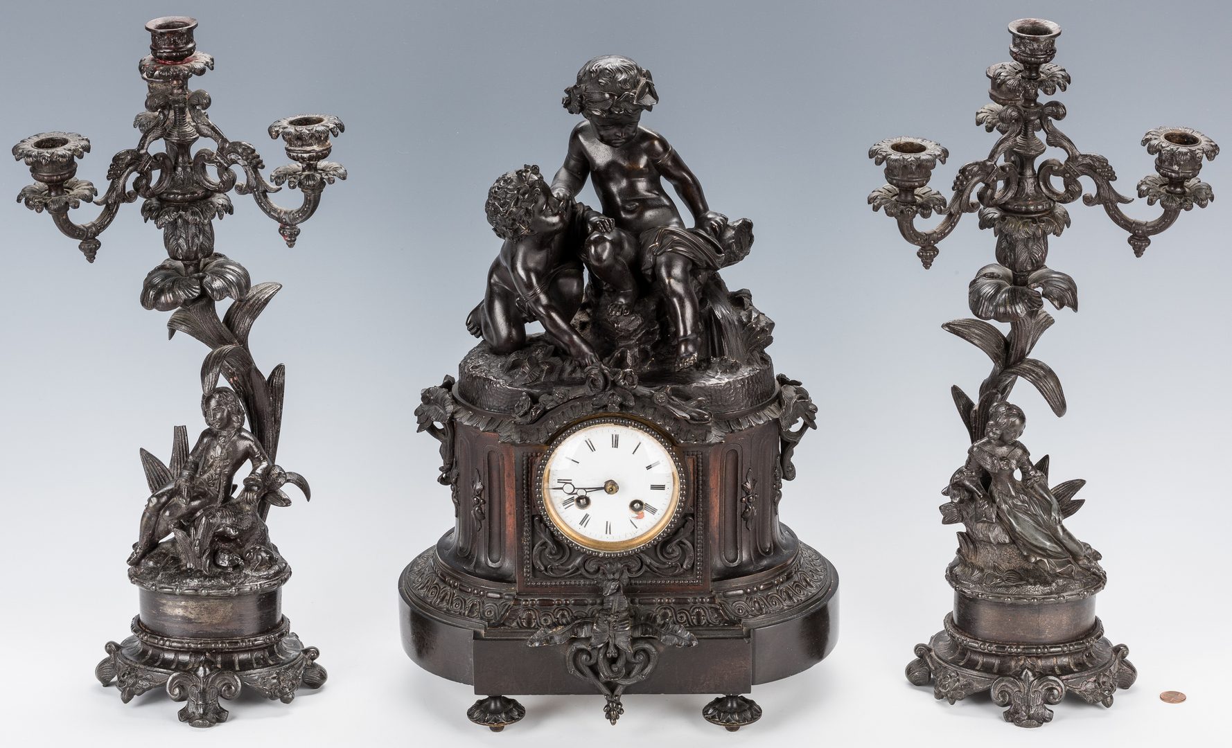 Lot 321: Figural French Bronze Clock Garniture