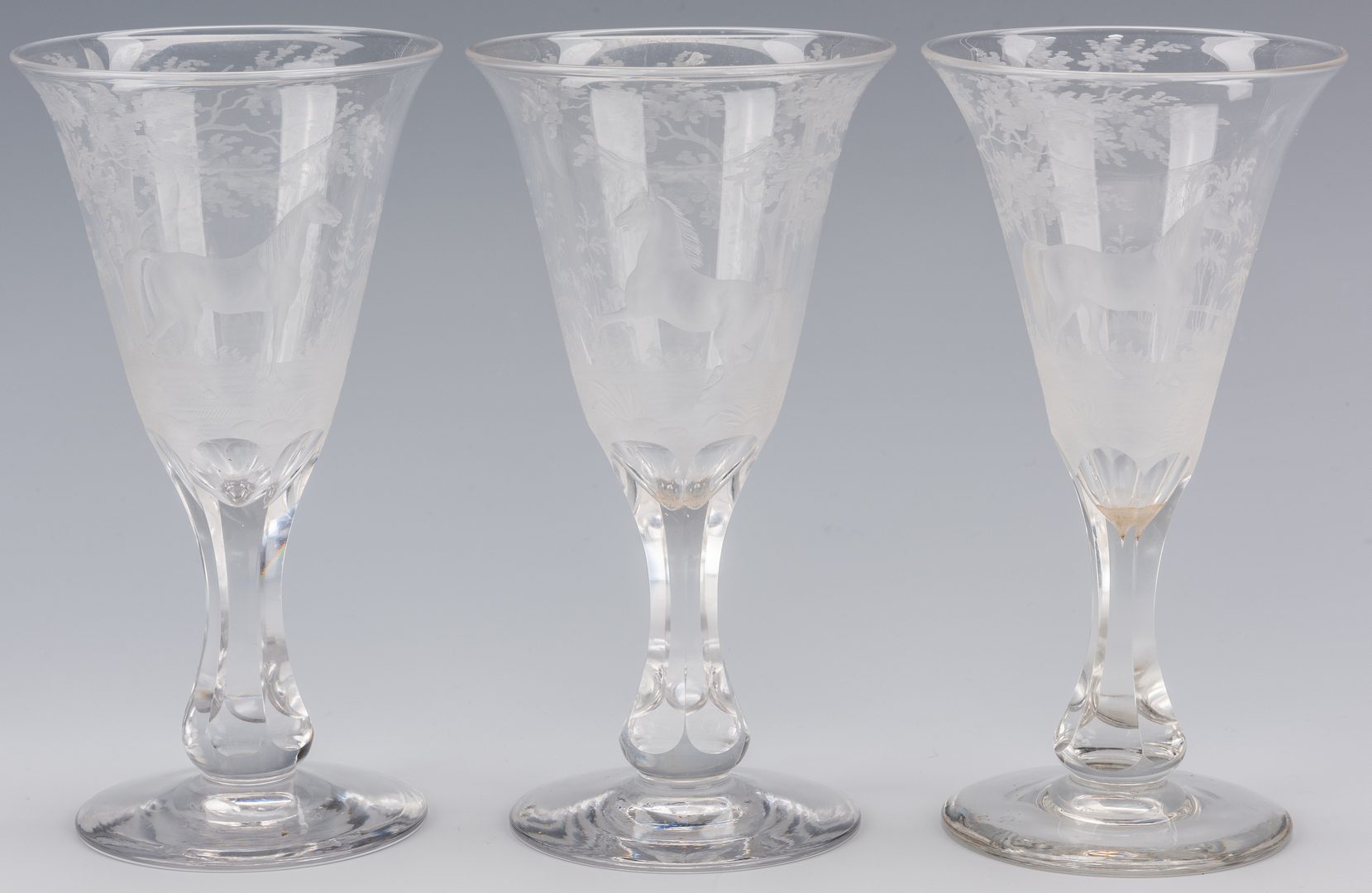Sold at Auction: 11 Vintage Etched Stemmed Water Glasses