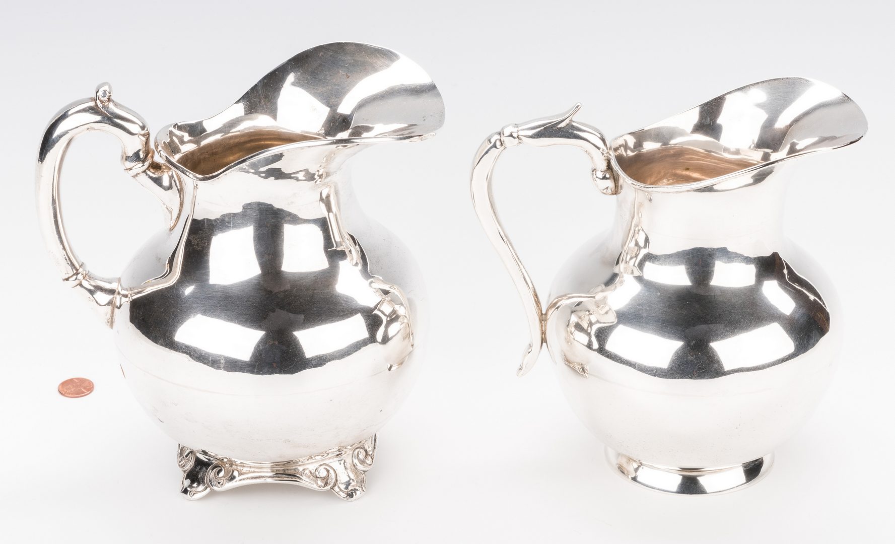 Lot 410: 2 Mexican Silver Water Pitchers