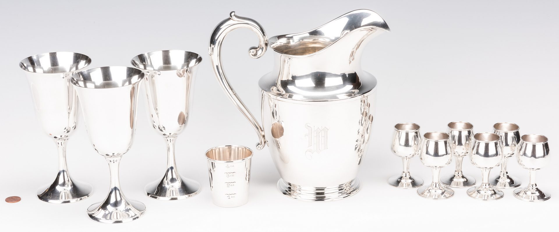 Lot 573: 11 Sterling Silver Hollowware Beverage Items