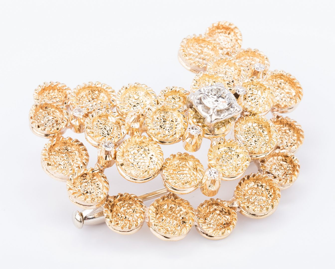 Lot 685: 18K Italian Gold Swirl Pin with Diamonds