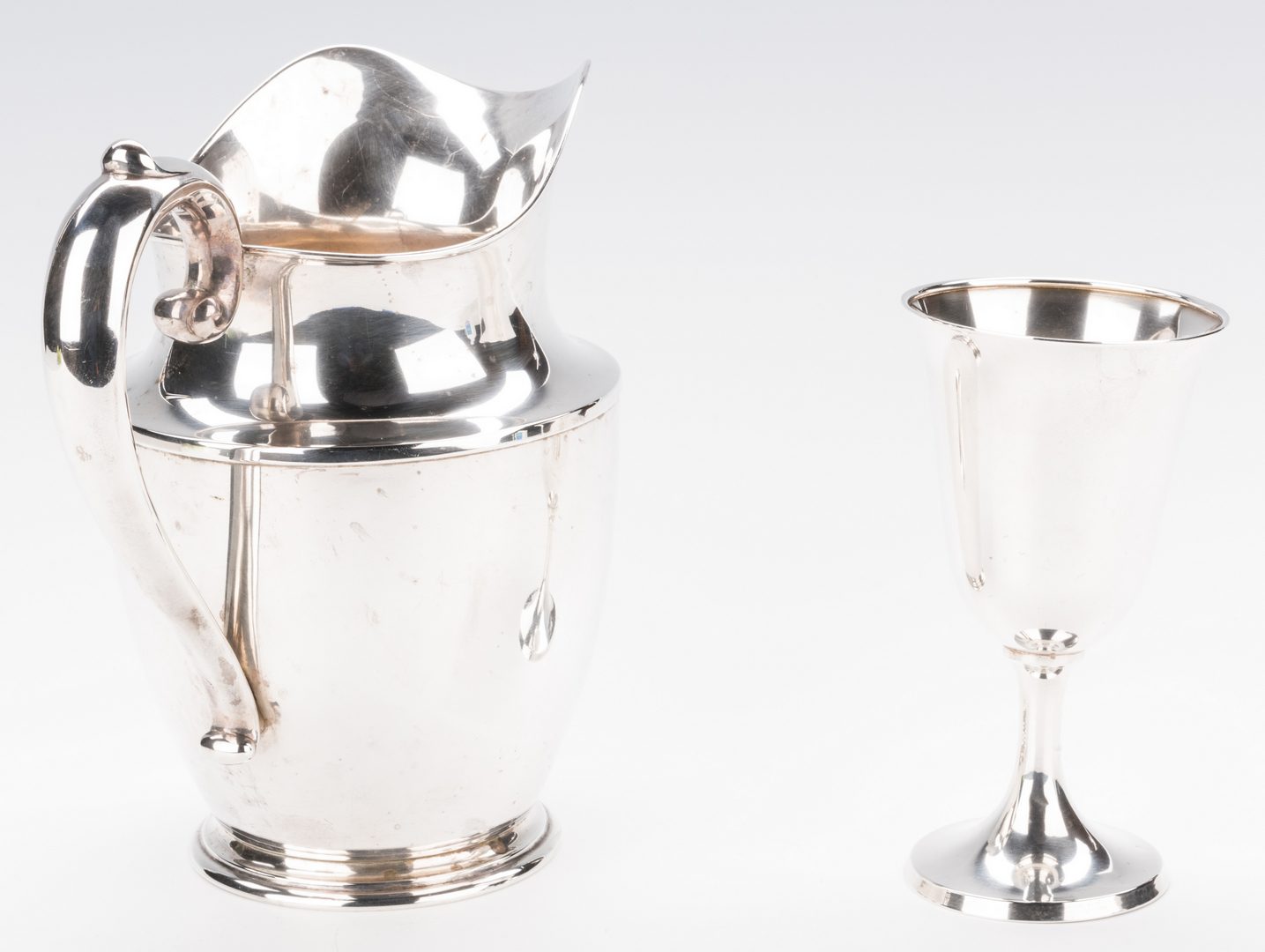 Lot 701: Wallace Sterling Water Pitcher w/ goblet