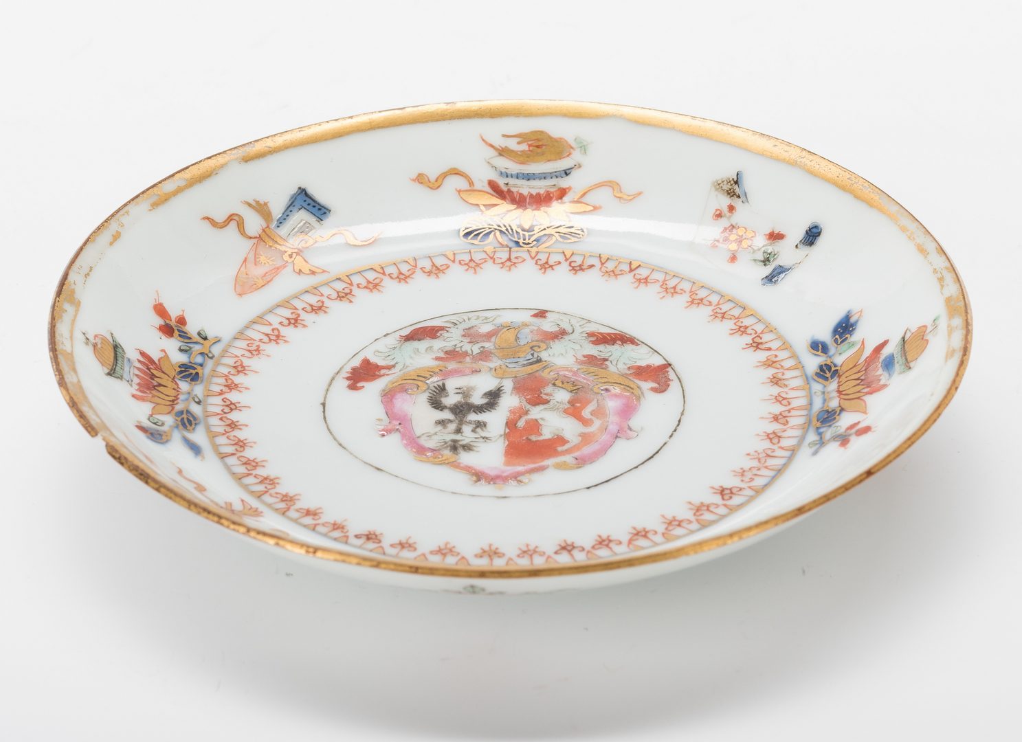 Lot 761: Chinese Export Armorial Cup & Saucer