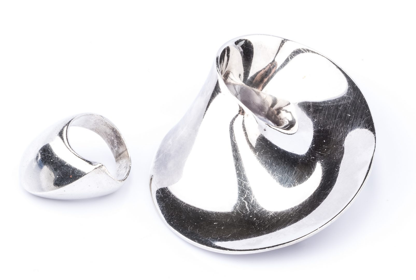 Lot 849: 2 George Jenson Modernist Silver Jewelry Items