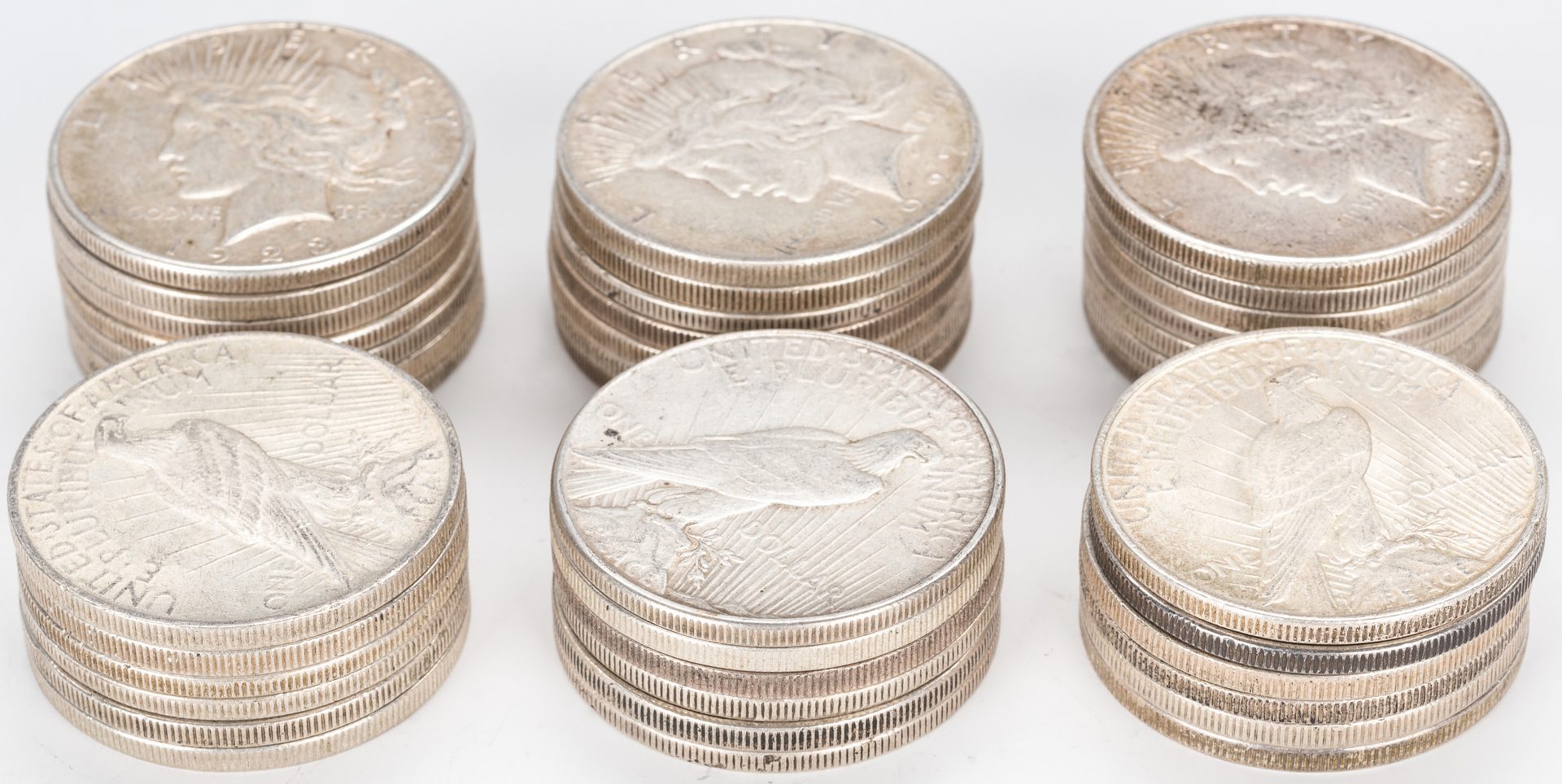 Lot 889: 39 U.S. Peace Silver Dollars (1922-1935)