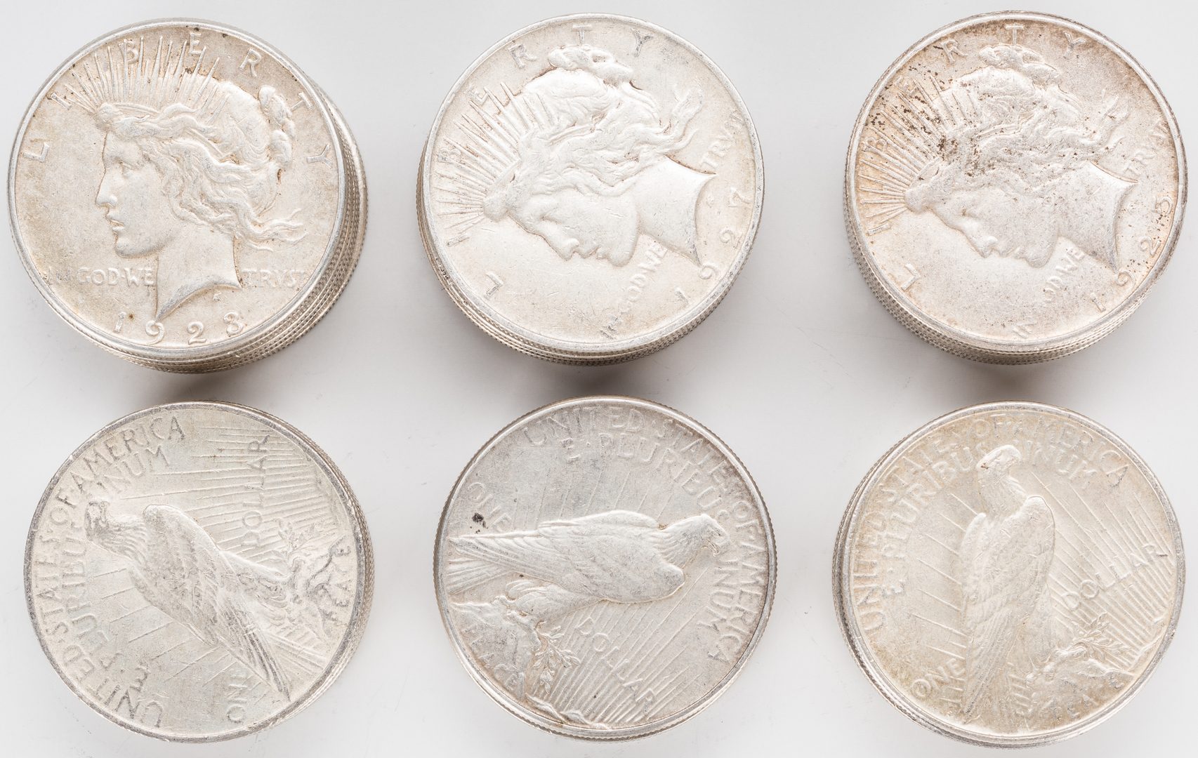Lot 889: 39 U.S. Peace Silver Dollars (1922-1935)