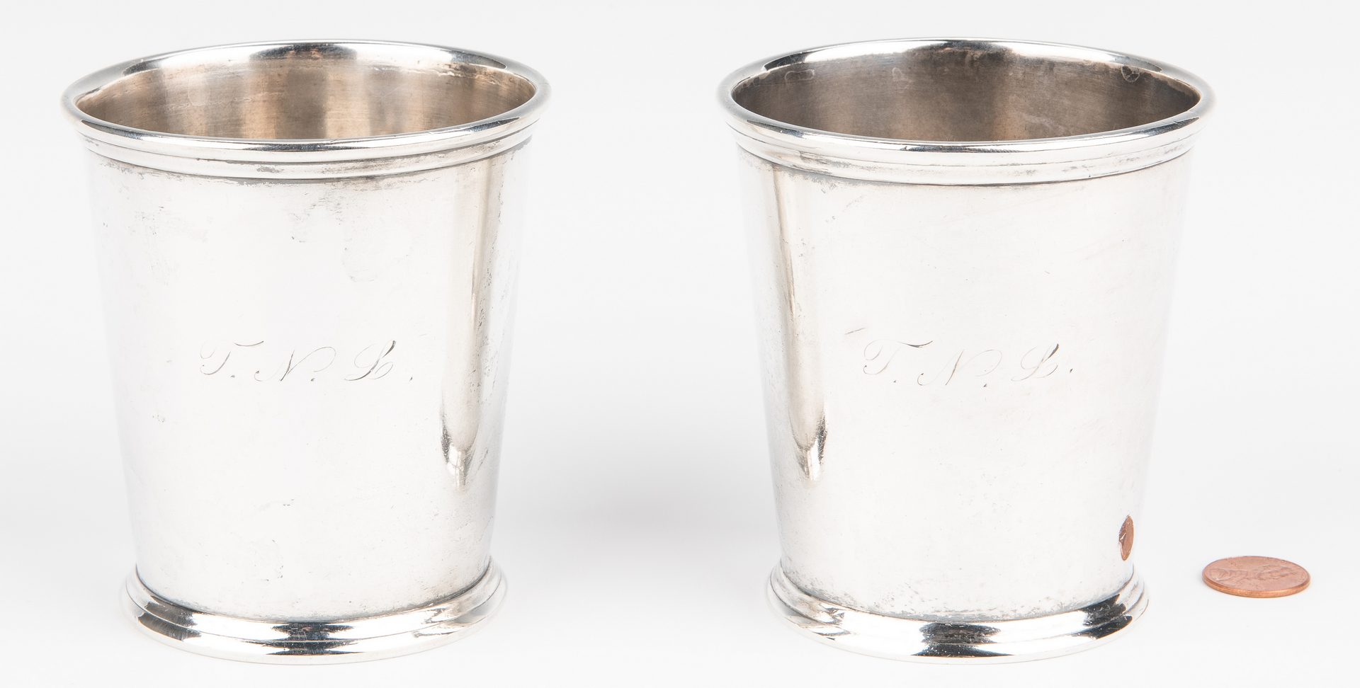Lot 202: 2 KY Coin Silver Julep Cups