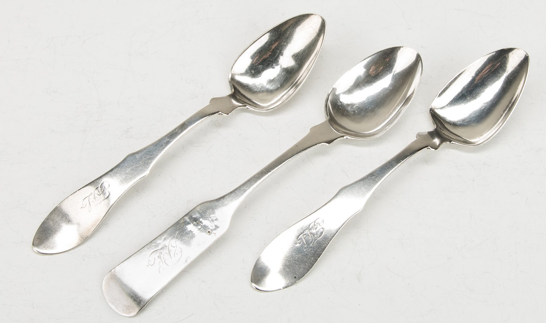 Lot 205: 7 Loomis Ky Coin silver spoons